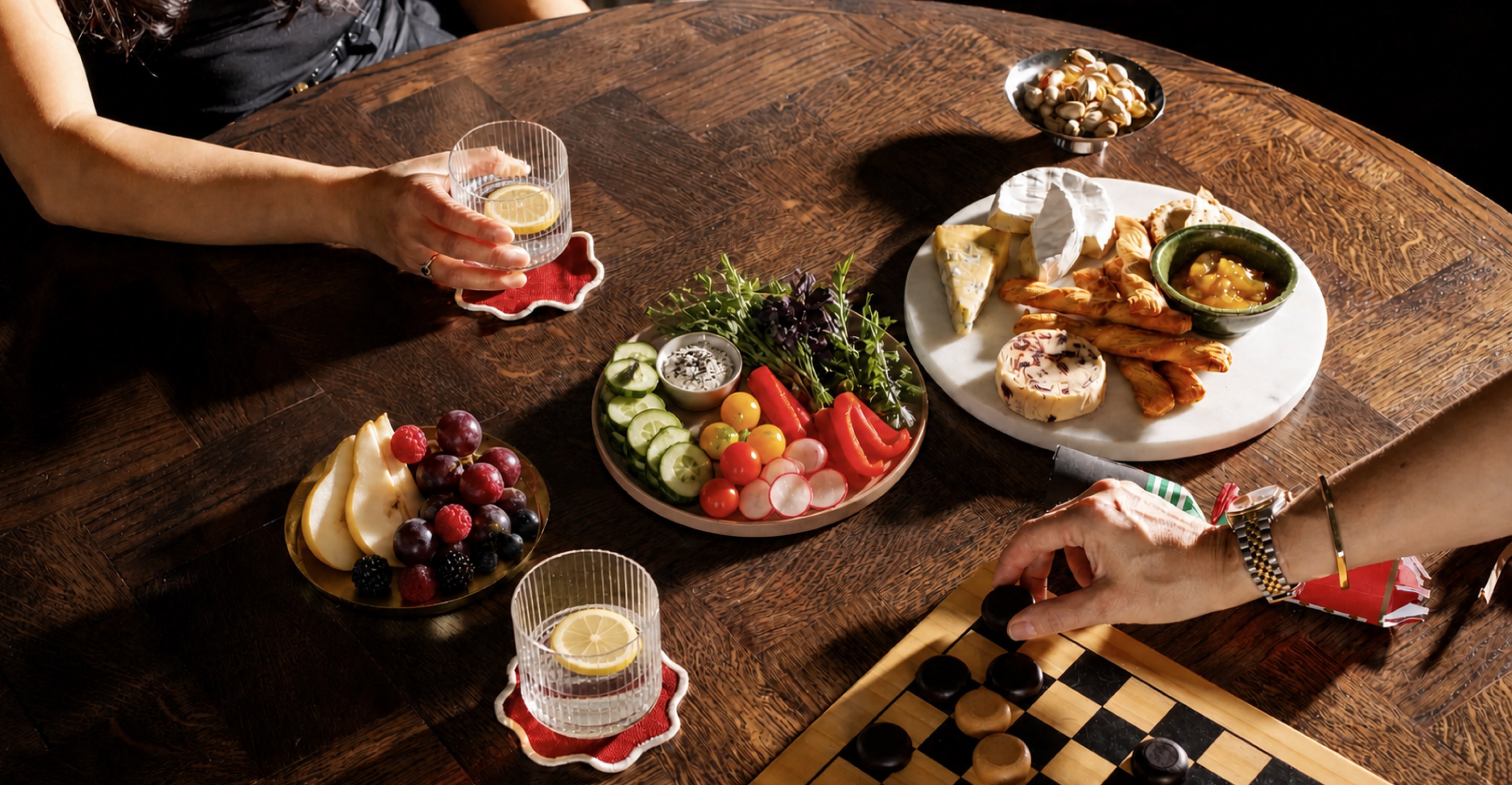 Foodfren hero — shared table with plates and snacks